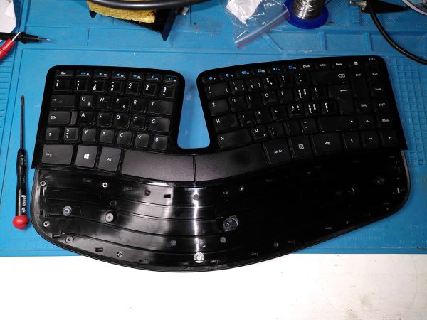 Removed wrist rest to access the screws