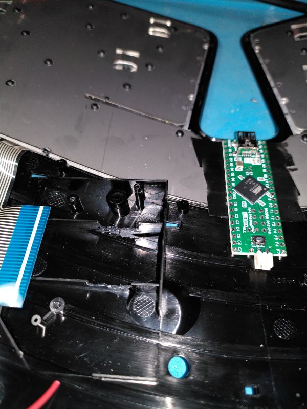 Remove internal plastic to make space for the adapter PCB and the Teensy